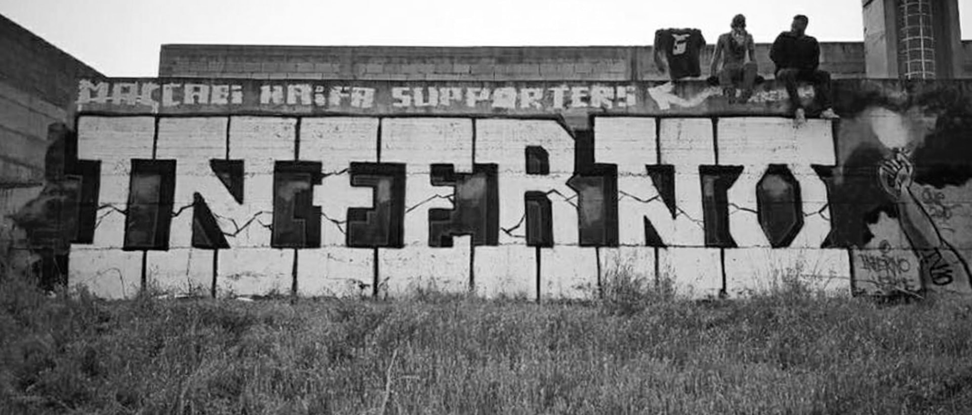 Wall piece — hand-painted, block-lettered, unmistakably Inferno.